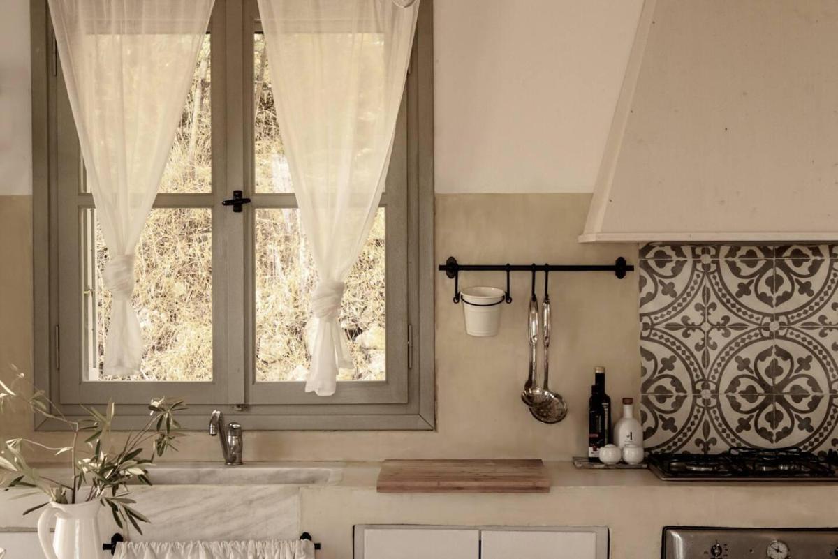 Pelagoo Residence - Amazing Stone House in Kalamos - Housity