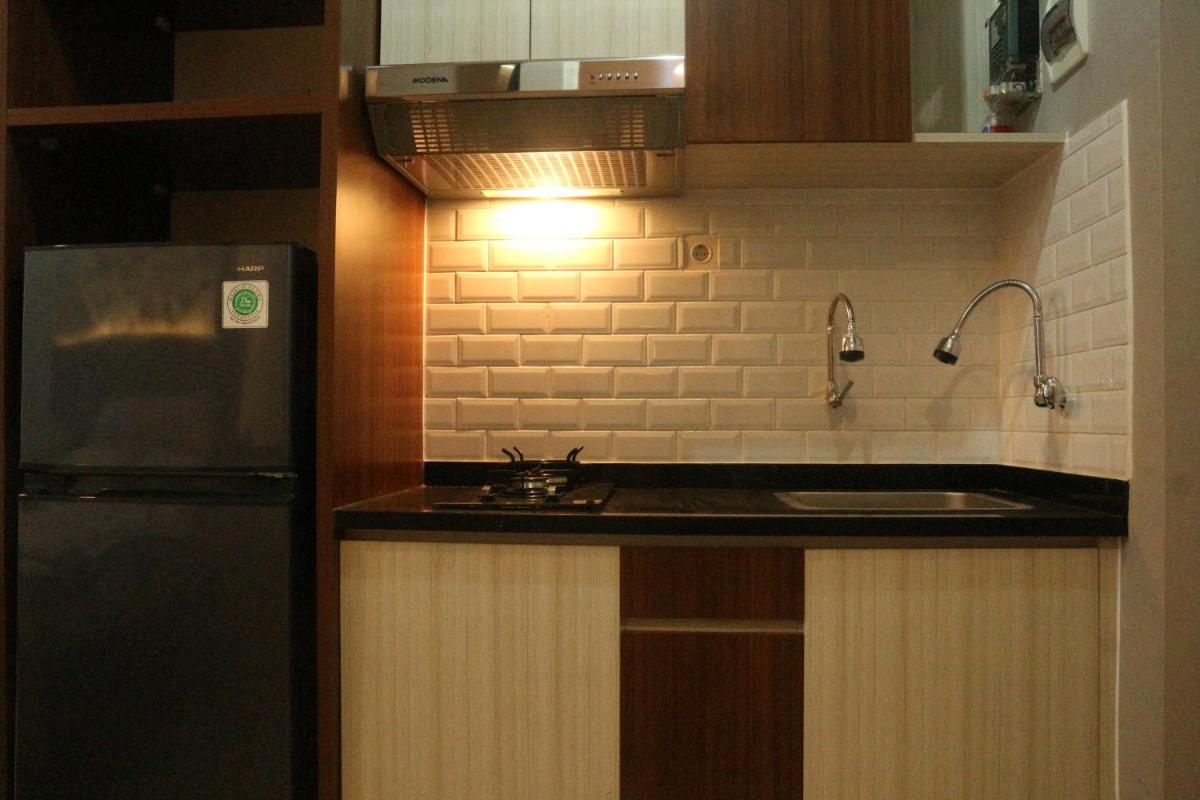 Apartemen The Springlake Summarecon by Cheapinn - Housity