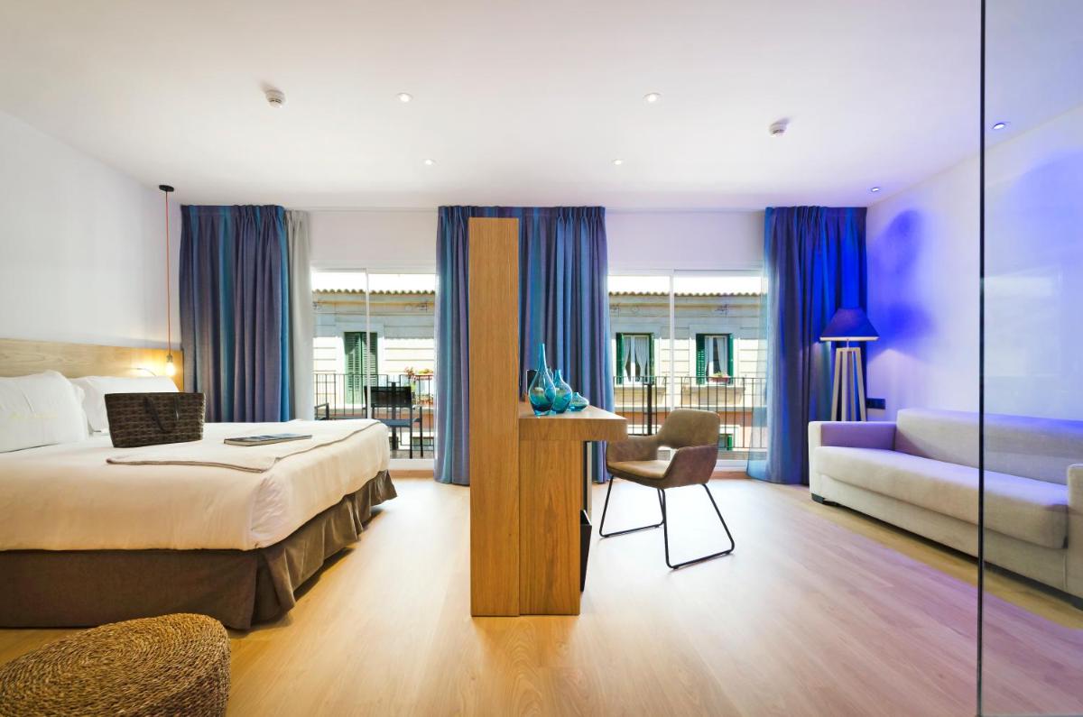 Cama o camas de una habitación en Hotel Saratoga