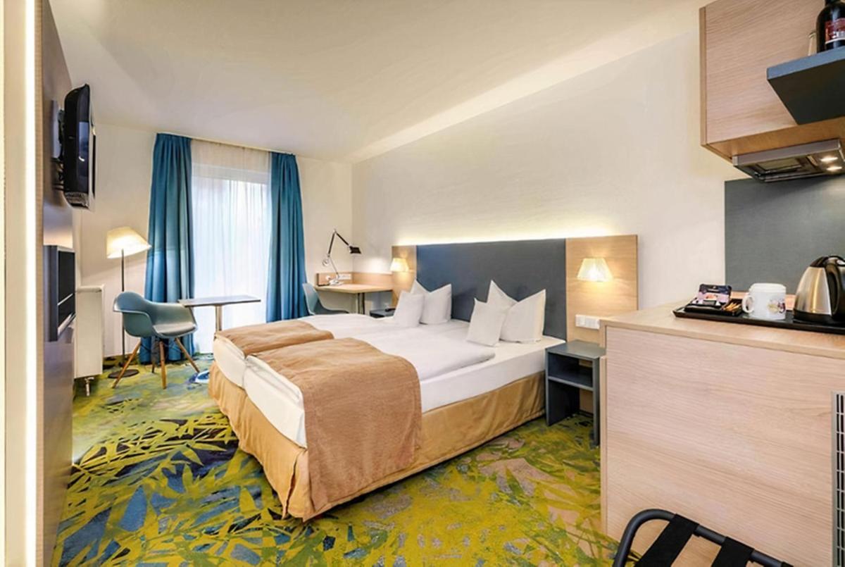 PLAZA INN Regensburg - Housity
