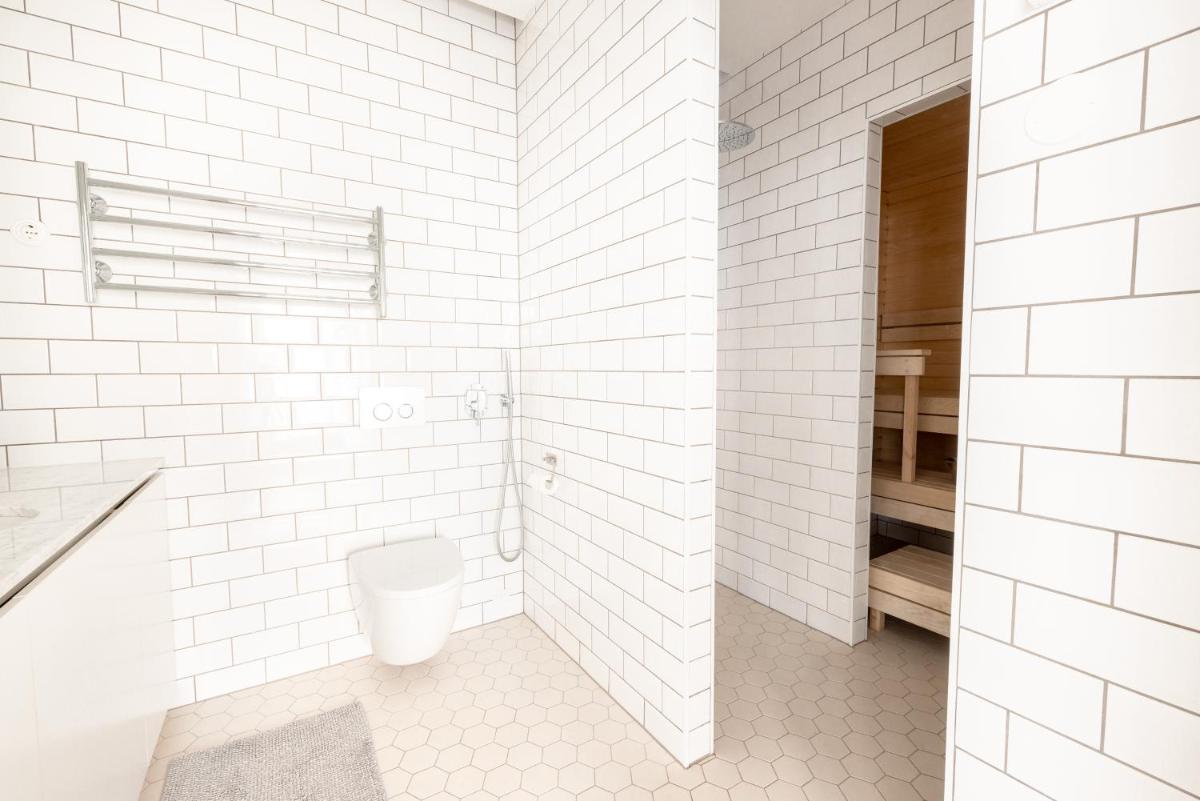 POISTA 2ndhomes Stunning and Luminous 2BR Loft House w Sauna in Eira - Housity