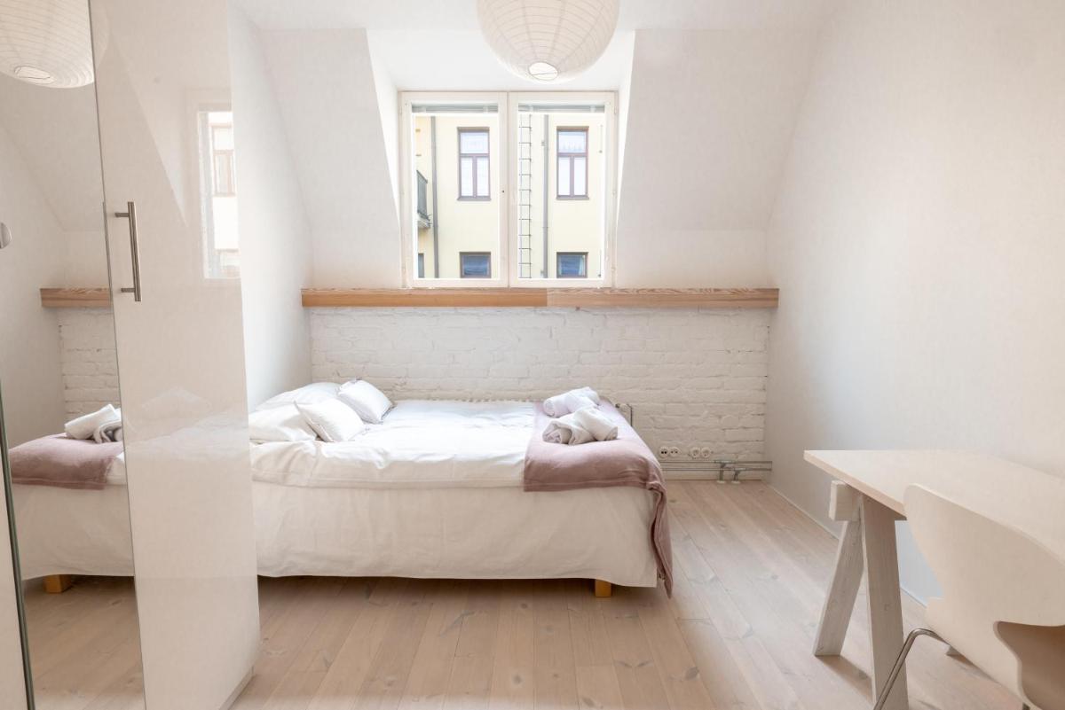 POISTA 2ndhomes Stunning and Luminous 2BR Loft House w Sauna in Eira - Housity