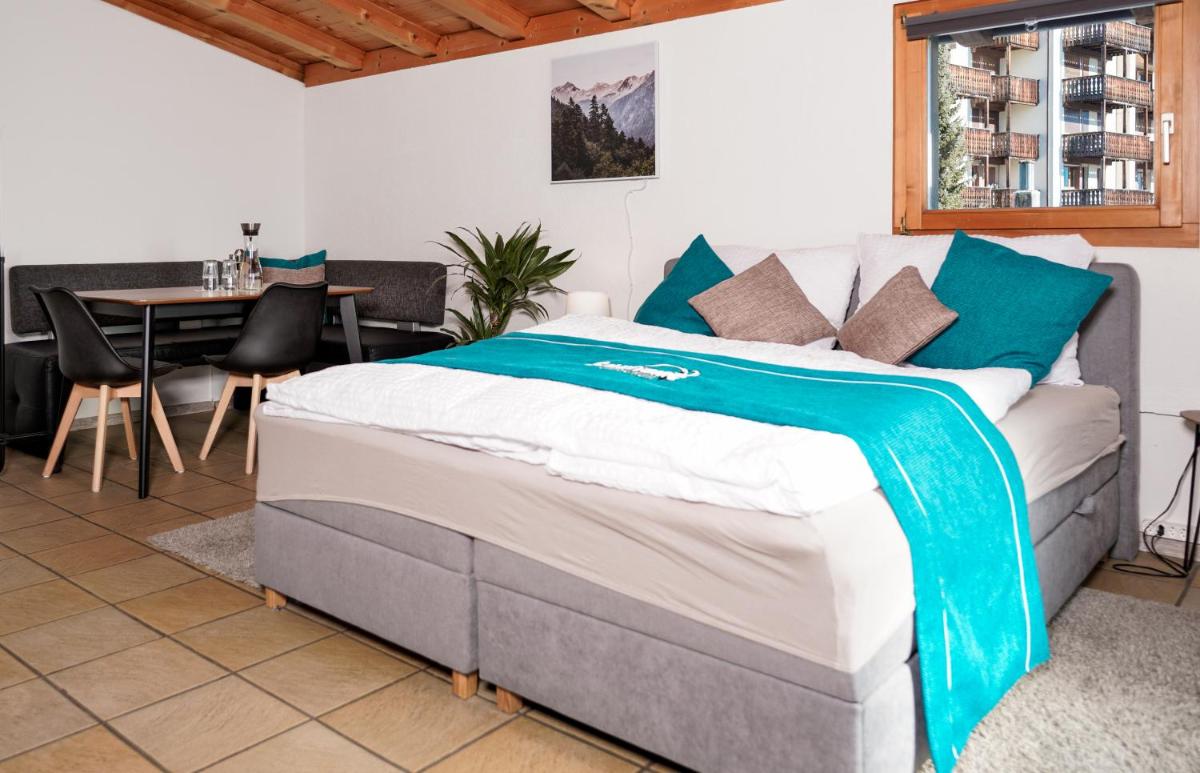 Solution-Grischun, Parkplatz - Küche- Wäschetrokner- Kaffee, Tee - Hizvo