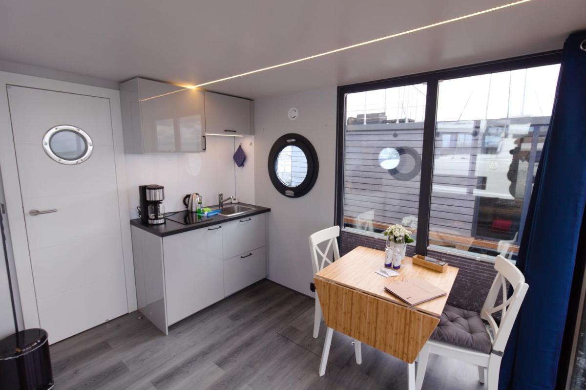 Hausboot Fjord Aquila mit Dachterrasse in Wendtorf - Housity