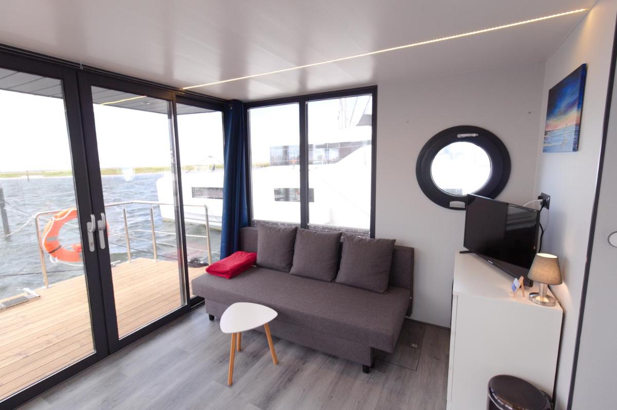 Hausboot Fjord Aquila mit Dachterrasse in Wendtorf - Housity