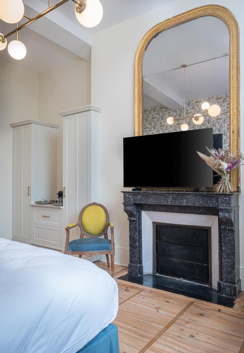 Télévision ou salle de divertissement dans l'établissement La Borde en Sologne Château & Spa