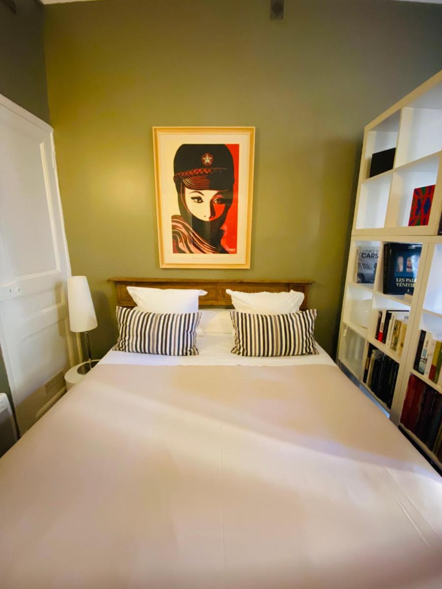 Un ou plusieurs lits dans un hébergement de l'établissement Hôtel Particulier Le 28 - Spa & Art Luxury Design by Alain Ducasse