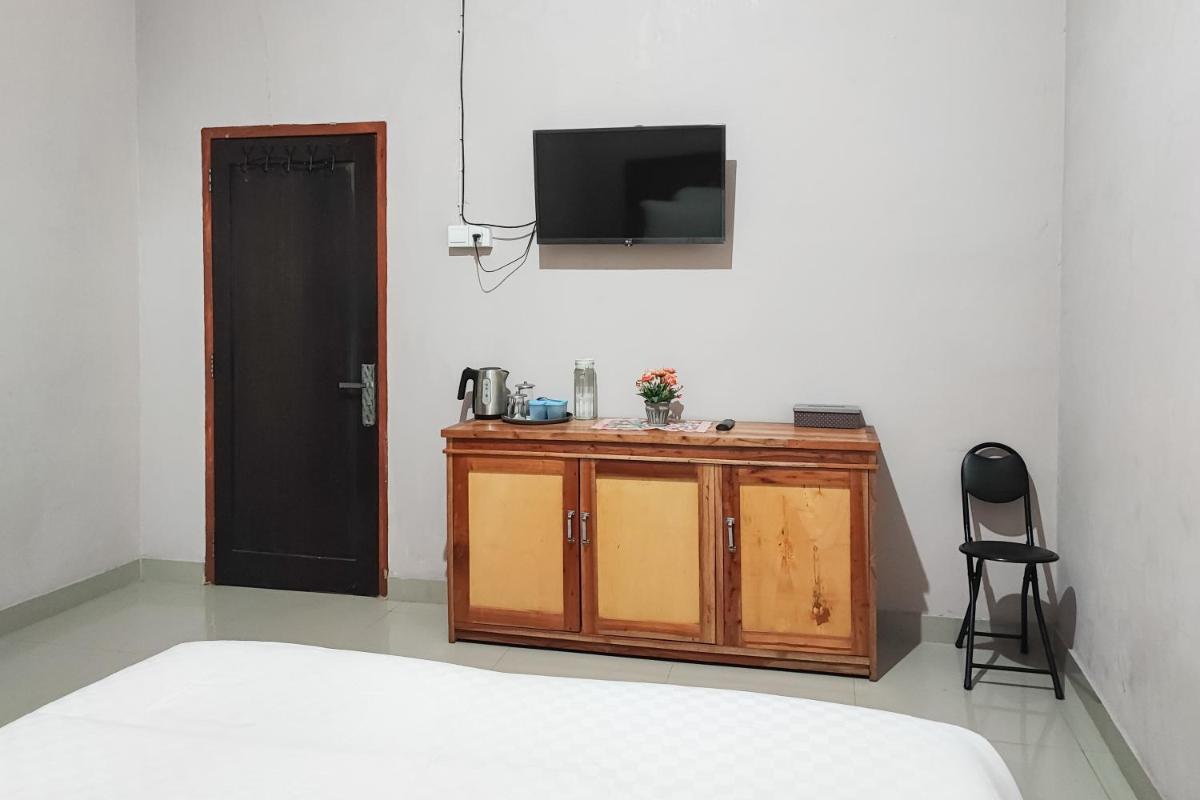 RedDoorz Syariah Near Tugu Macan Kayu Aro - Housity