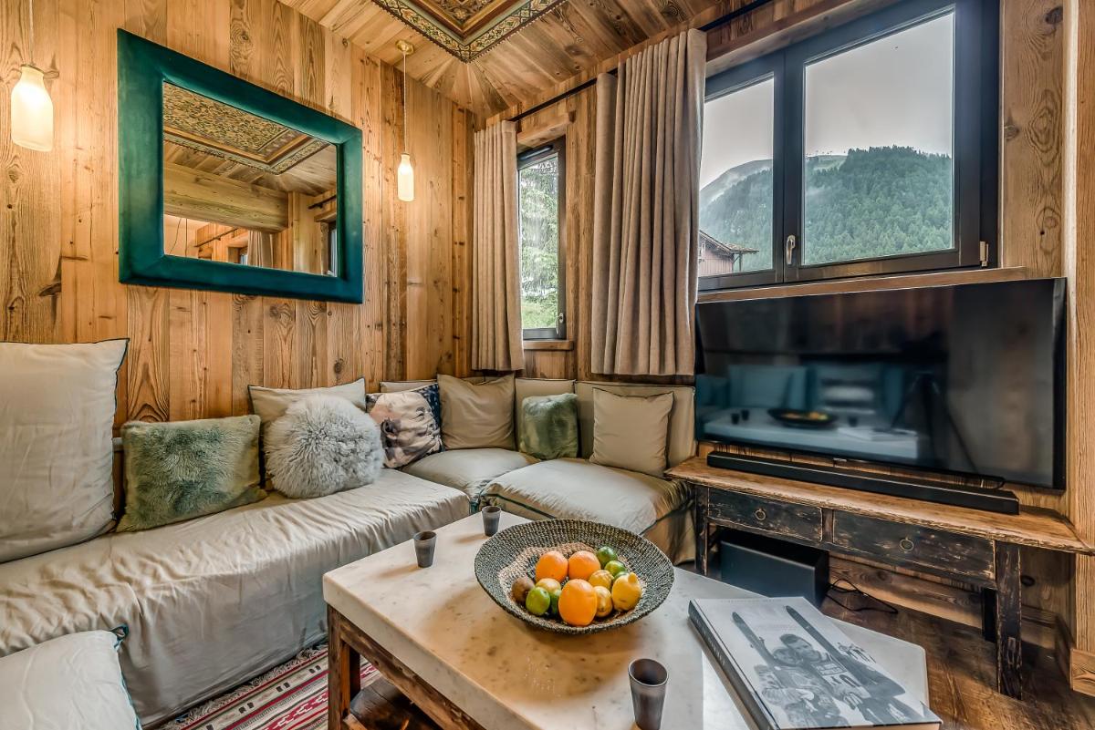 Coin salon dans l'établissement Hotel & Spa Le Val d'Isère