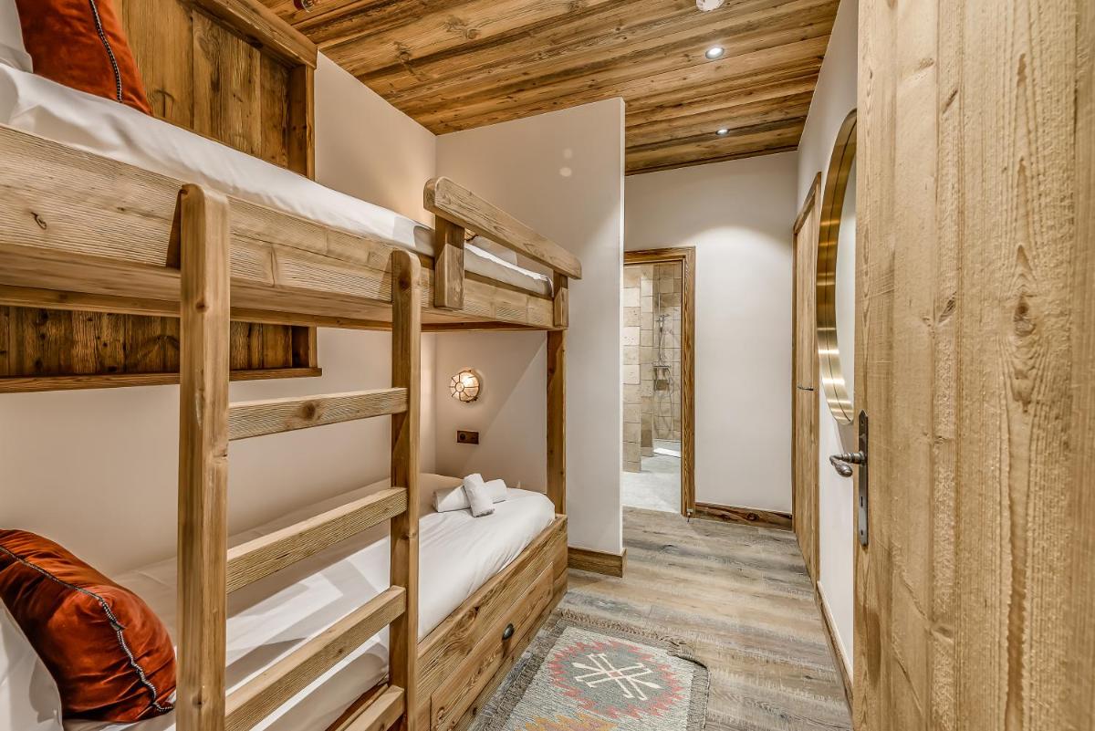 Un ou plusieurs lits dans un hébergement de l'établissement Hotel & Spa Le Val d'Isère