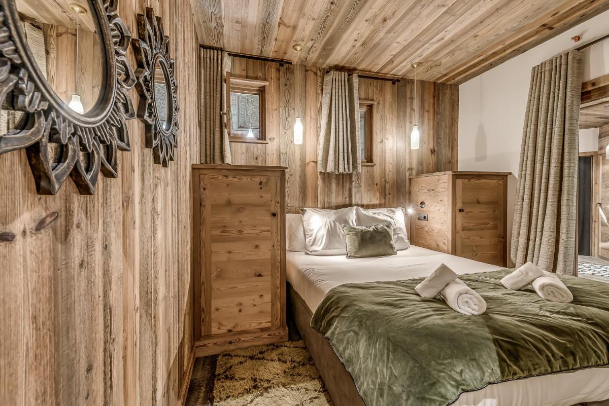 Un ou plusieurs lits dans un hébergement de l'établissement Hotel & Spa Le Val d'Isère