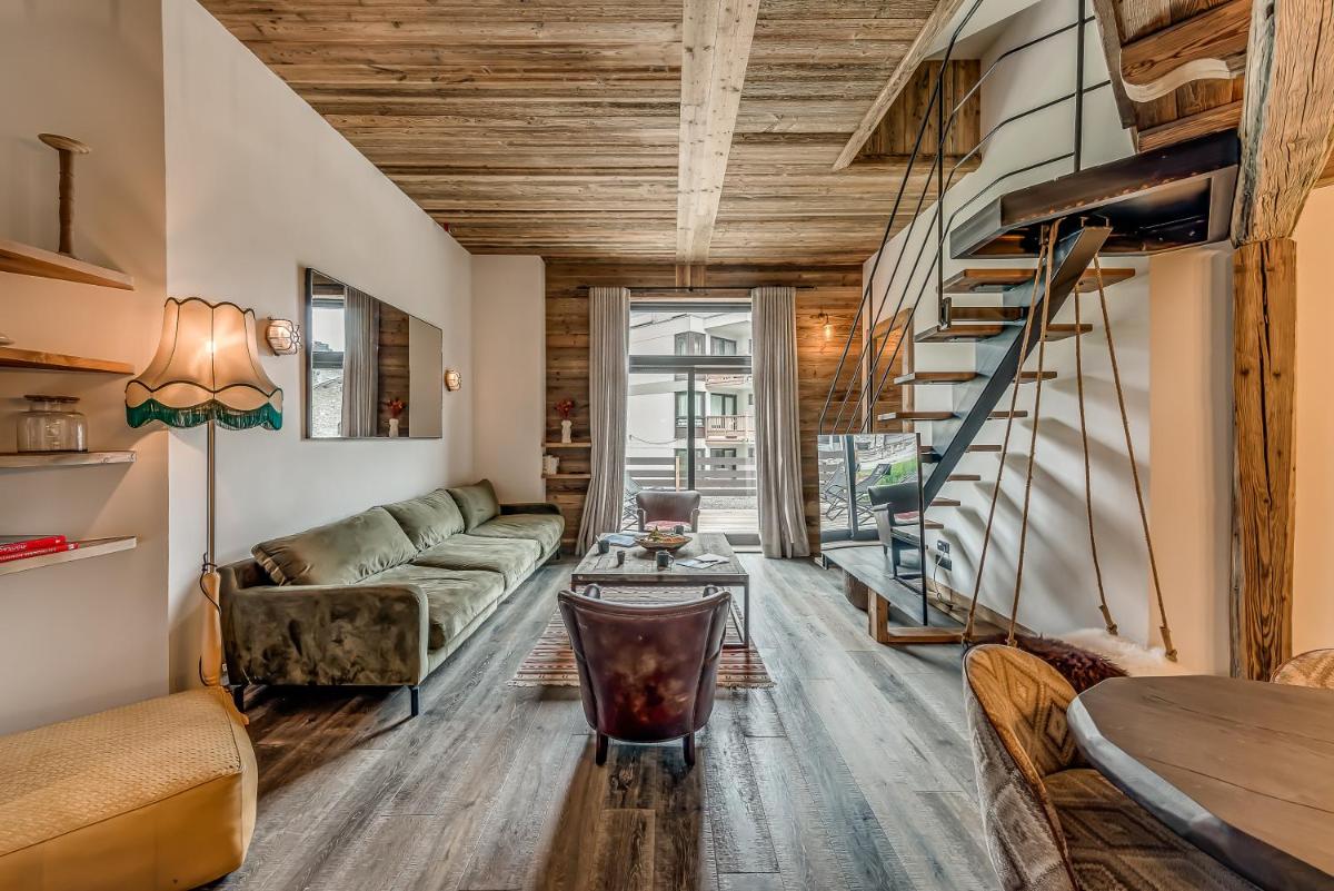 Coin salon dans l'établissement Hotel & Spa Le Val d'Isère
