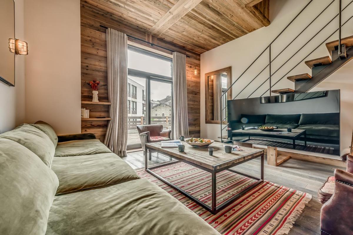 Coin salon dans l'établissement Hotel & Spa Le Val d'Isère