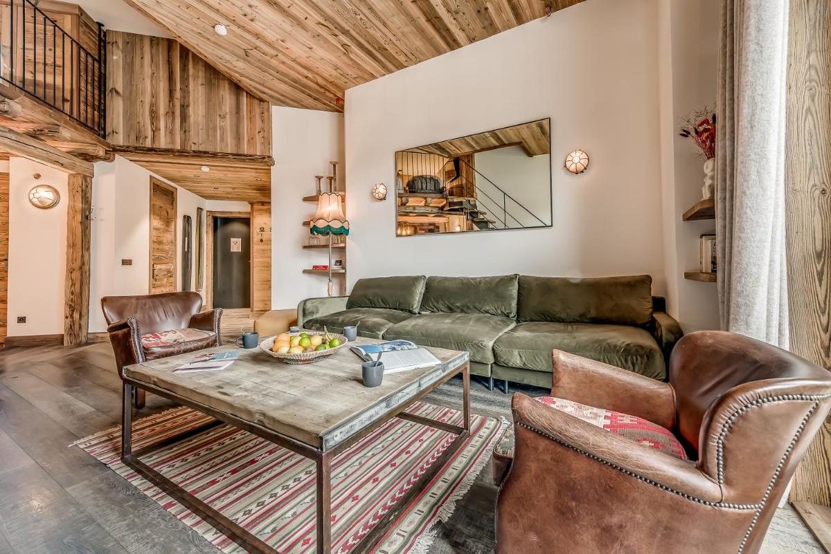Coin salon dans l'établissement Hotel & Spa Le Val d'Isère
