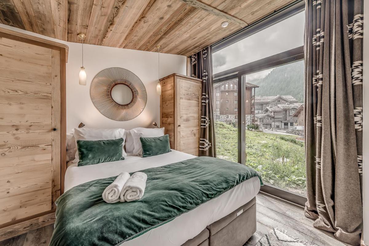 Un ou plusieurs lits dans un hébergement de l'établissement Hotel & Spa Le Val d'Isère