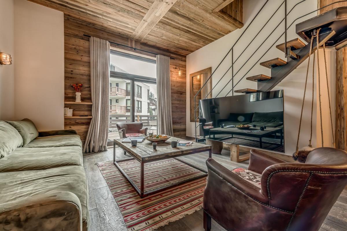 Coin salon dans l'établissement Hotel & Spa Le Val d'Isère