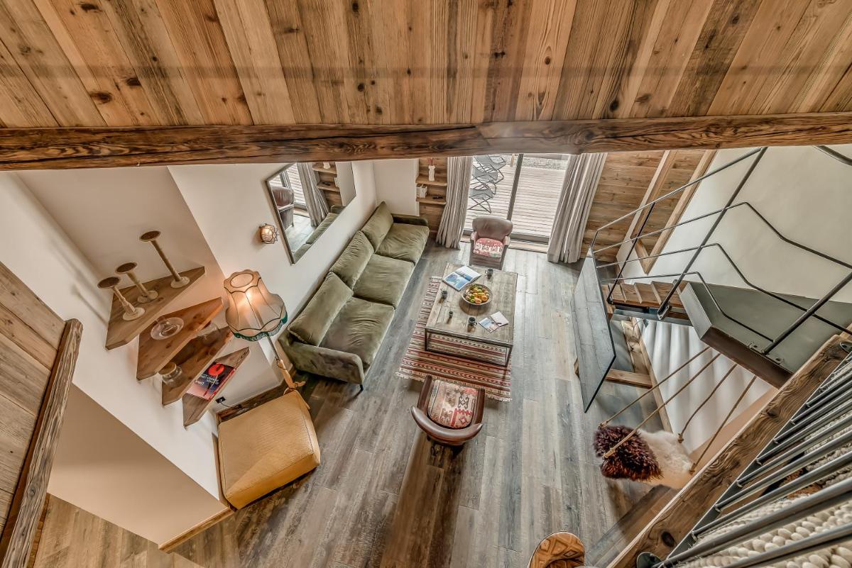 Coin salon dans l'établissement Hotel & Spa Le Val d'Isère