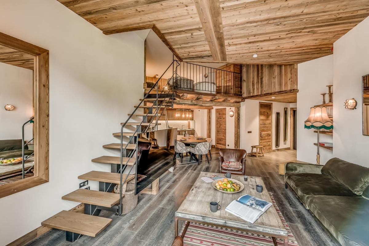 Coin salon dans l'établissement Hotel & Spa Le Val d'Isère
