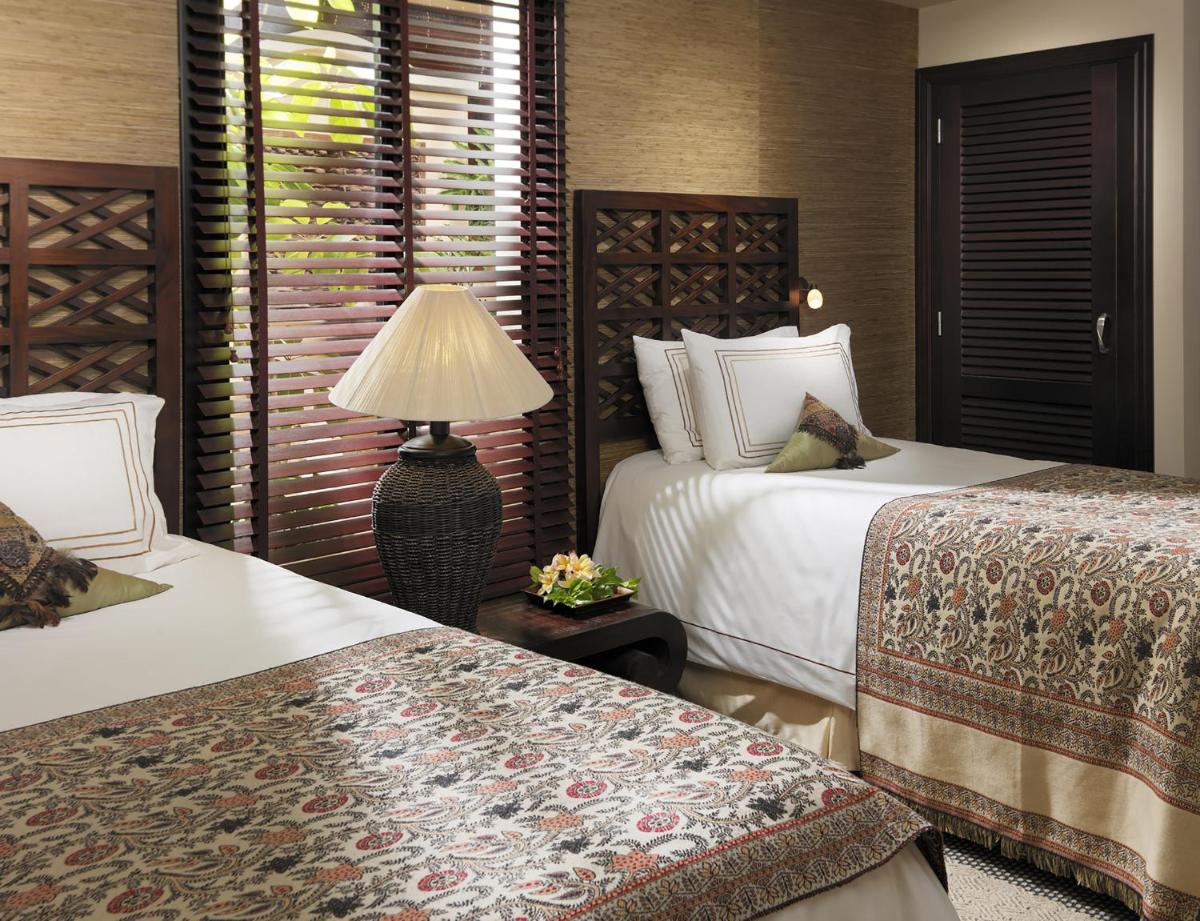 Cama o camas de una habitación en Royal Garden Villas, Luxury Hotel