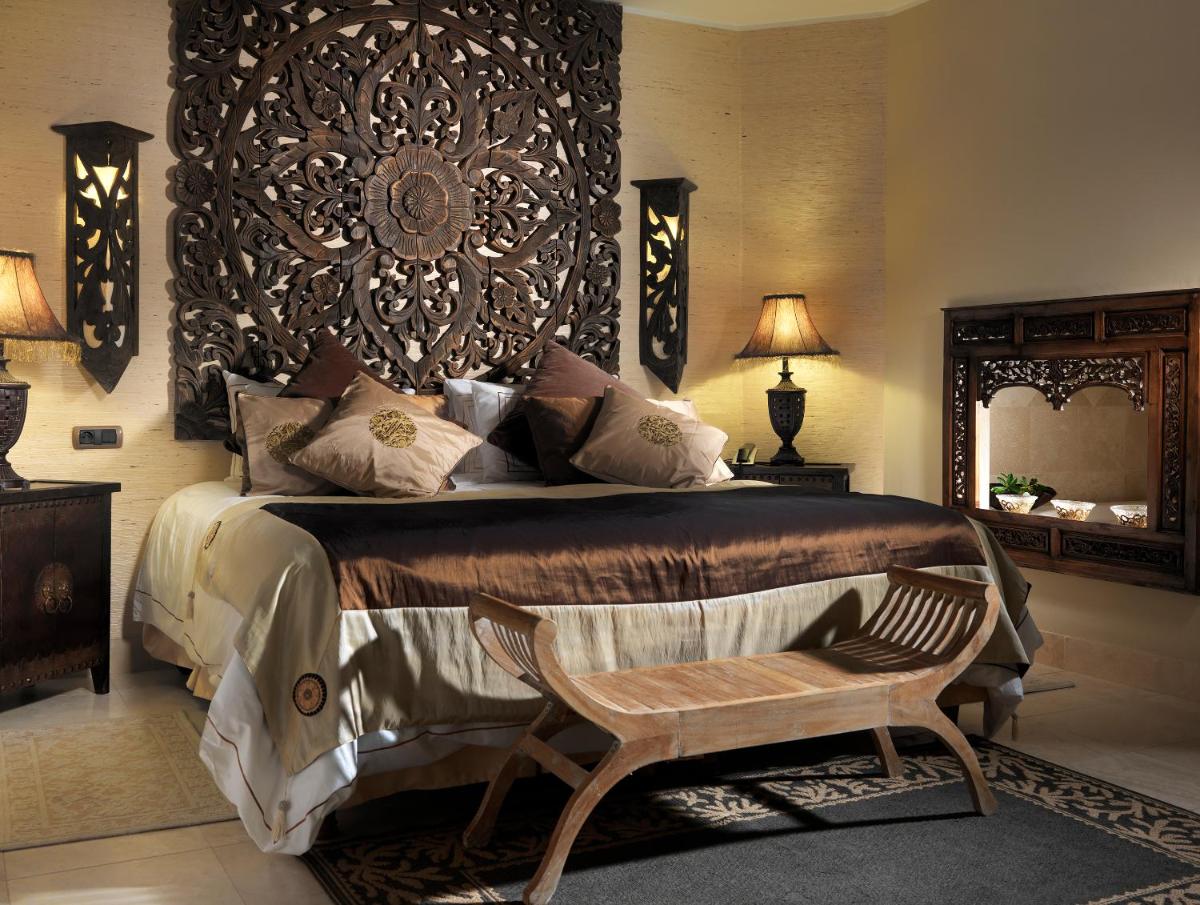 Cama o camas de una habitación en Royal Garden Villas, Luxury Hotel