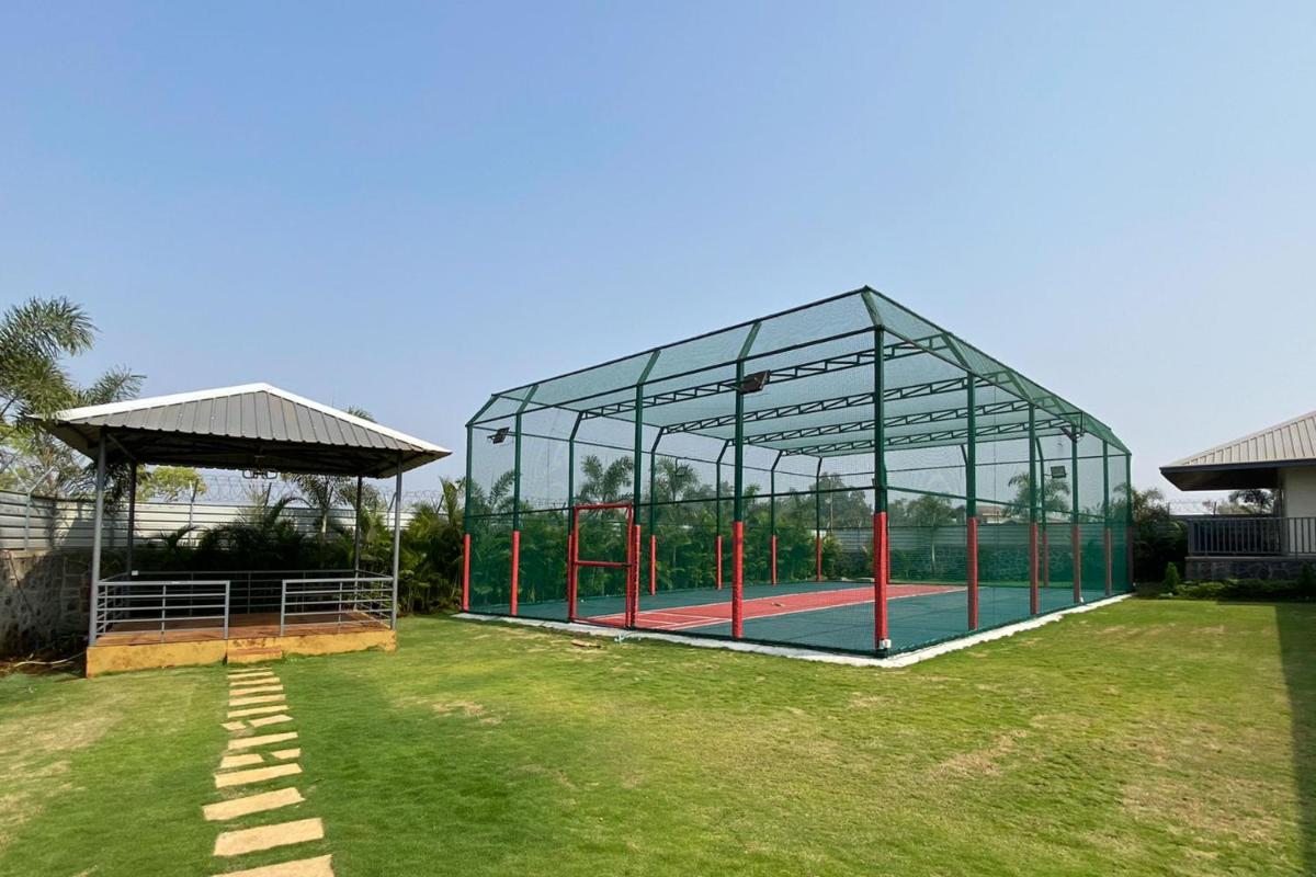 Ferias Vita by StayVista with Turf, Rainshower, Lawn, Swimming pool and Gazebo - Housity