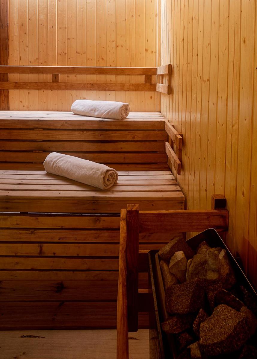 Uma cama ou camas num quarto em Hotel Porta do Sol Conference & SPA