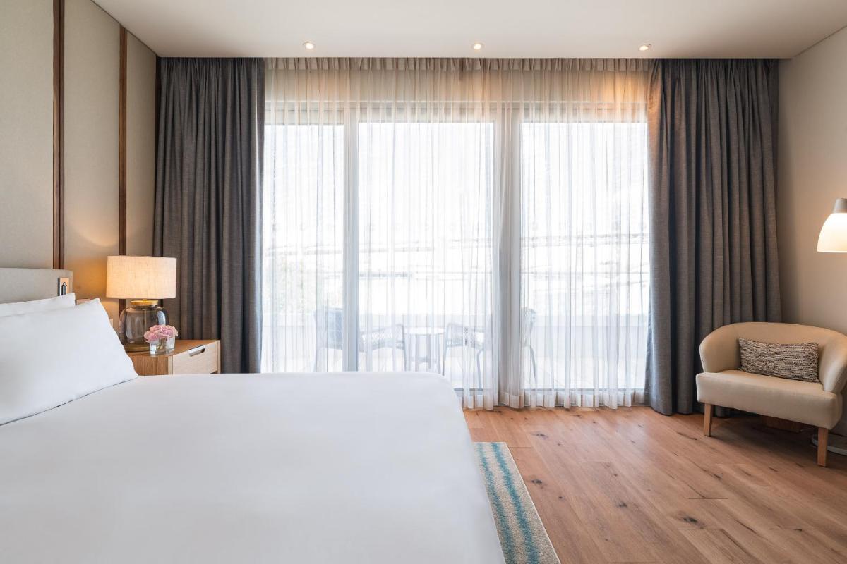 Uma cama ou camas num quarto em Hyatt Regency Lisbon