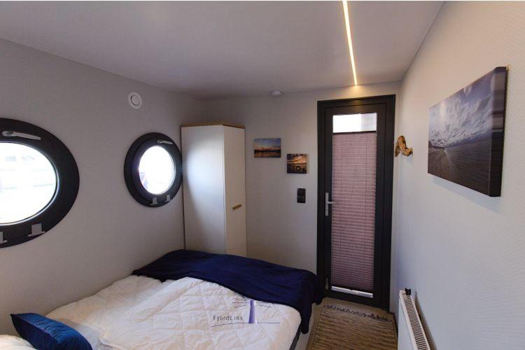 Hausboot Fjord Auriga mit Biosauna in Wendtorf - Housity