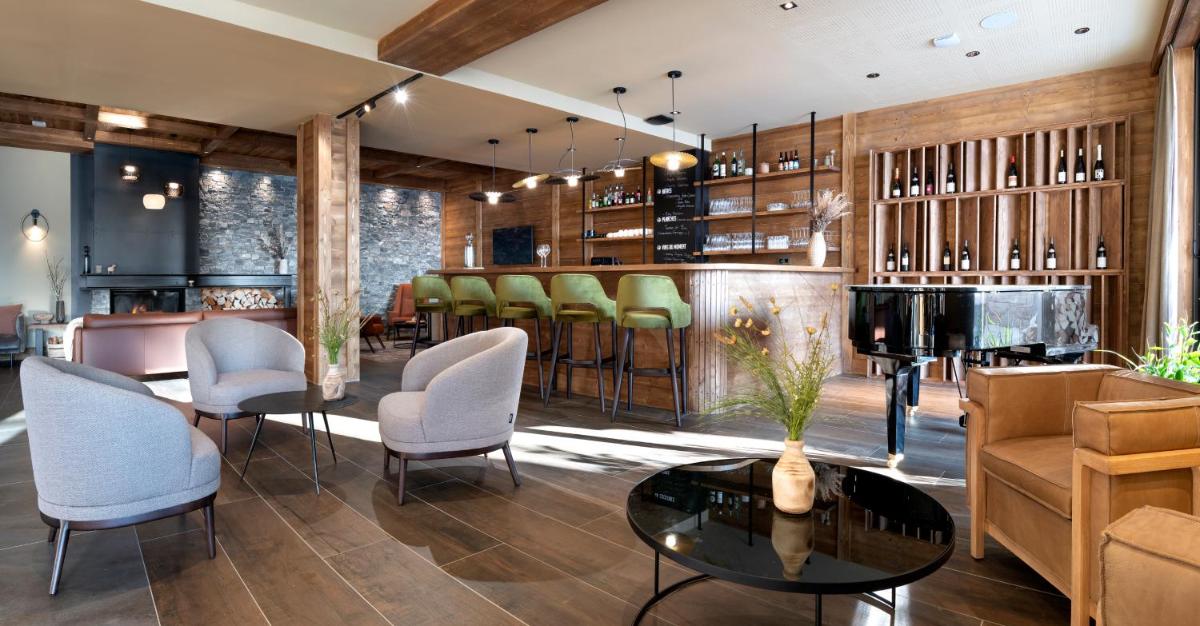 Coin salon dans l'établissement MGM Hôtels & Résidences - Résidence Chalets de Joy