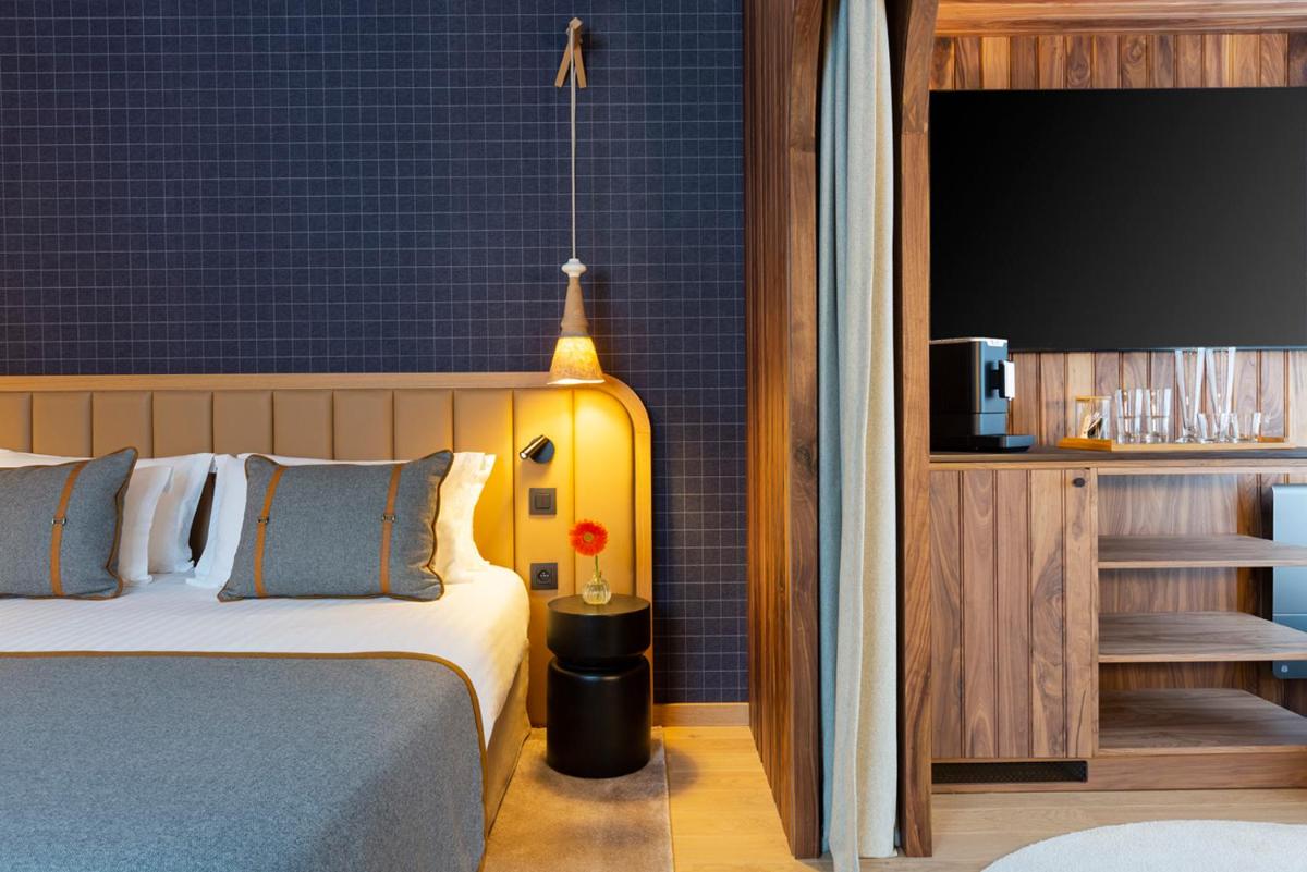 Un ou plusieurs lits dans un hébergement de l'établissement Heliopic Hotel & Spa