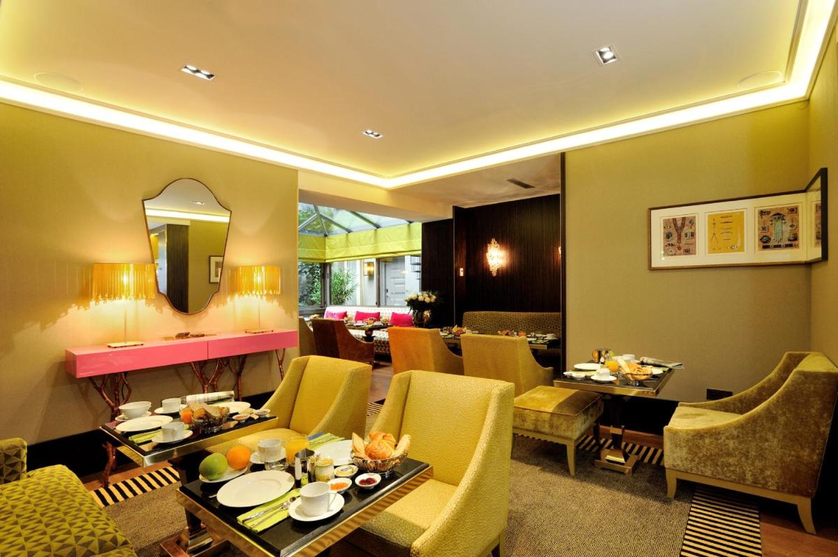 Coin salon dans l'établissement Hôtel Baume