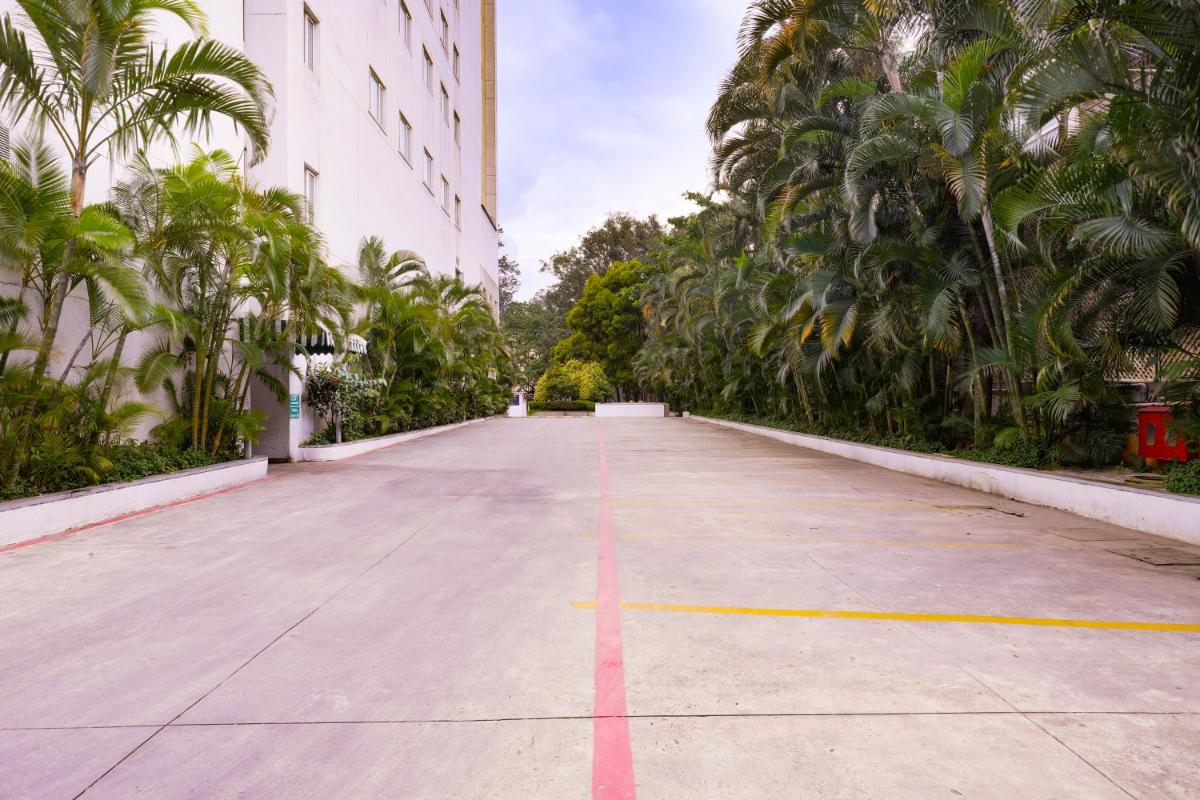 a road with a red line in the middle of a building at Lemon Tree Premier, Ulsoor Lake, Bengaluru in Bengaluru