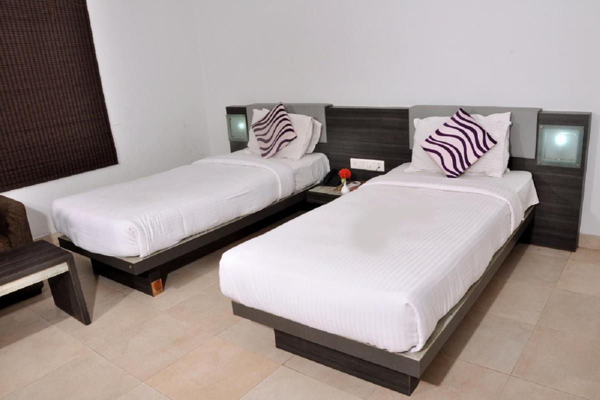 Hotel Palm shore - Housity