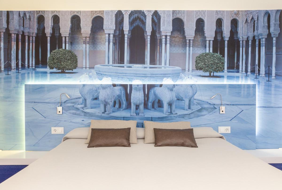 Zona de estar de Hotel Maciá Granada Five Senses Rooms & Suites