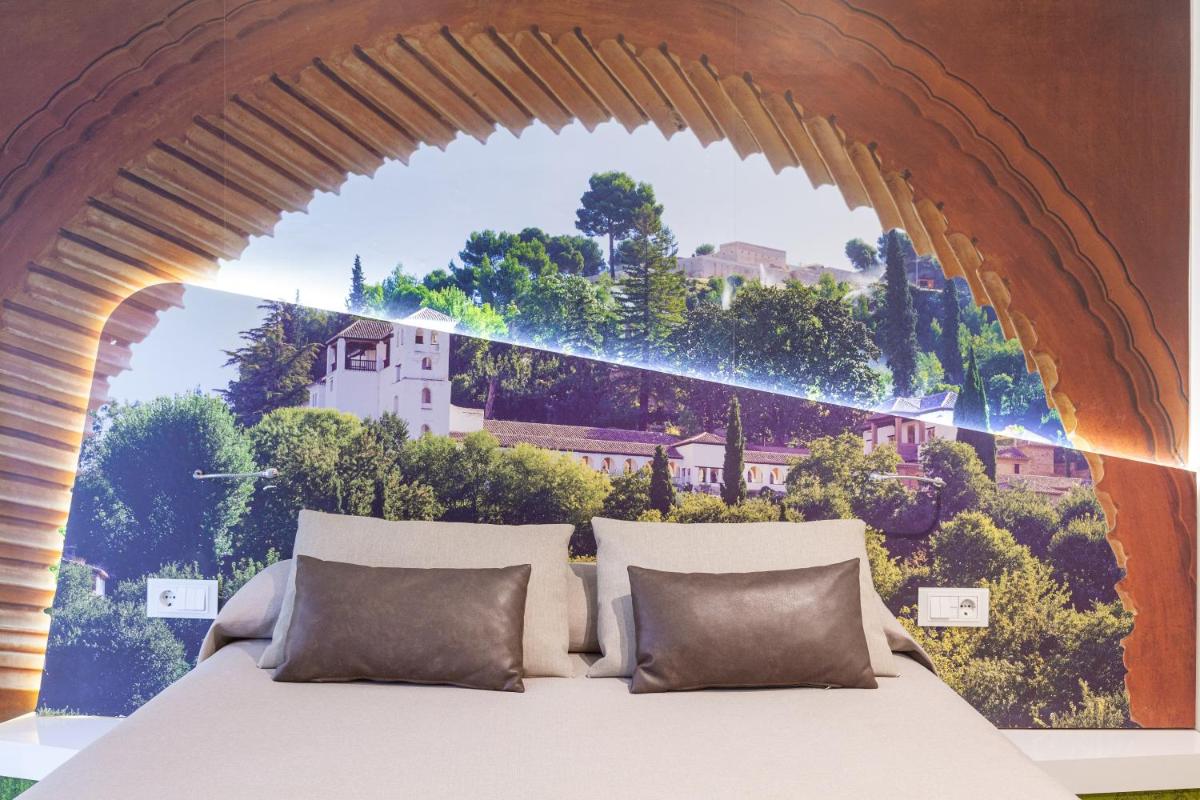 Zona de estar de Hotel Maciá Granada Five Senses Rooms & Suites