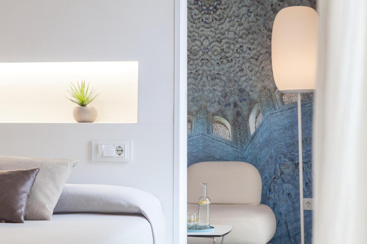Zona de estar de Hotel Maciá Granada Five Senses Rooms & Suites