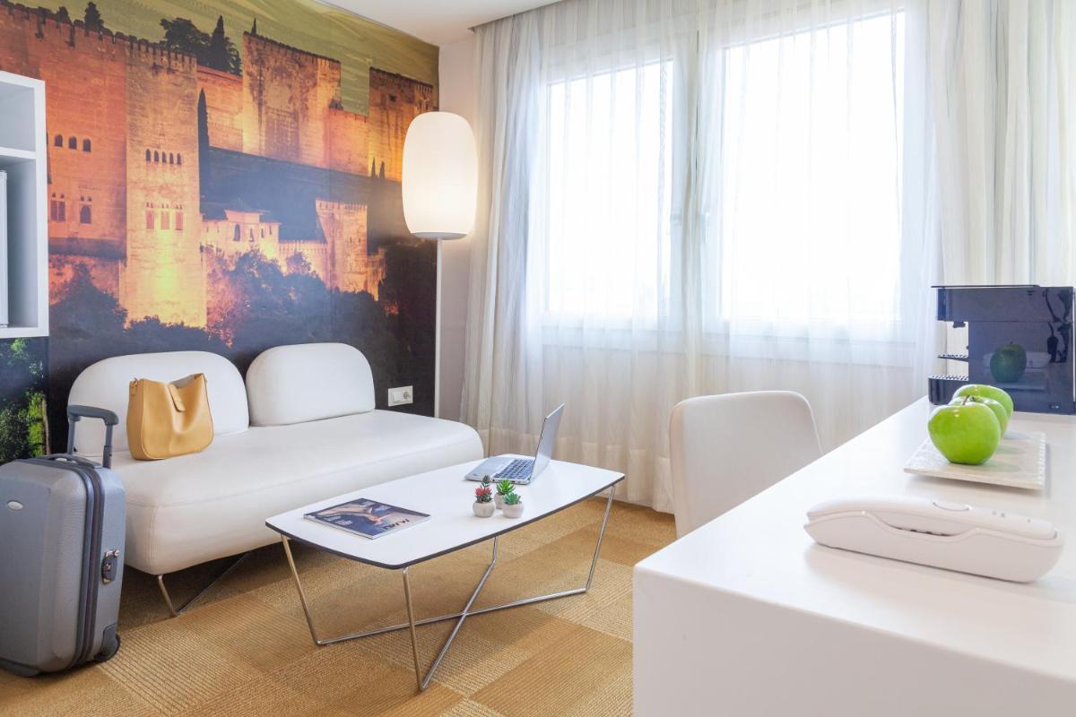 Zona de estar de Hotel Maciá Granada Five Senses Rooms & Suites
