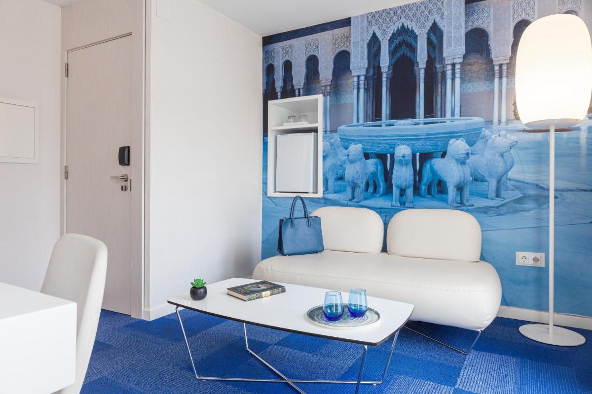 Zona de estar de Hotel Maciá Granada Five Senses Rooms & Suites