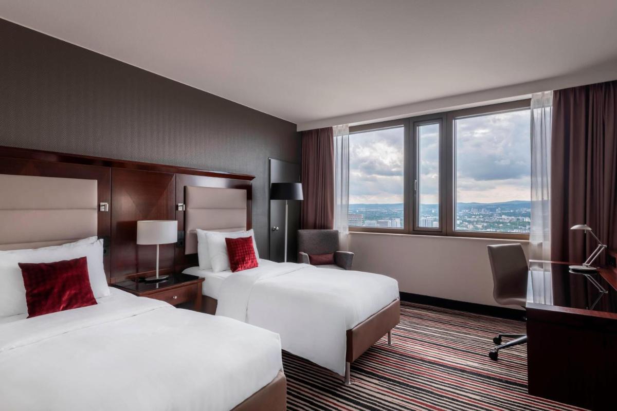 Ein Bett oder Betten in einem Zimmer der Unterkunft Frankfurt Marriott Hotel Ein Bett oder Betten in einem Zimmer der Unterkunft Frankfurt Marriott Hotel