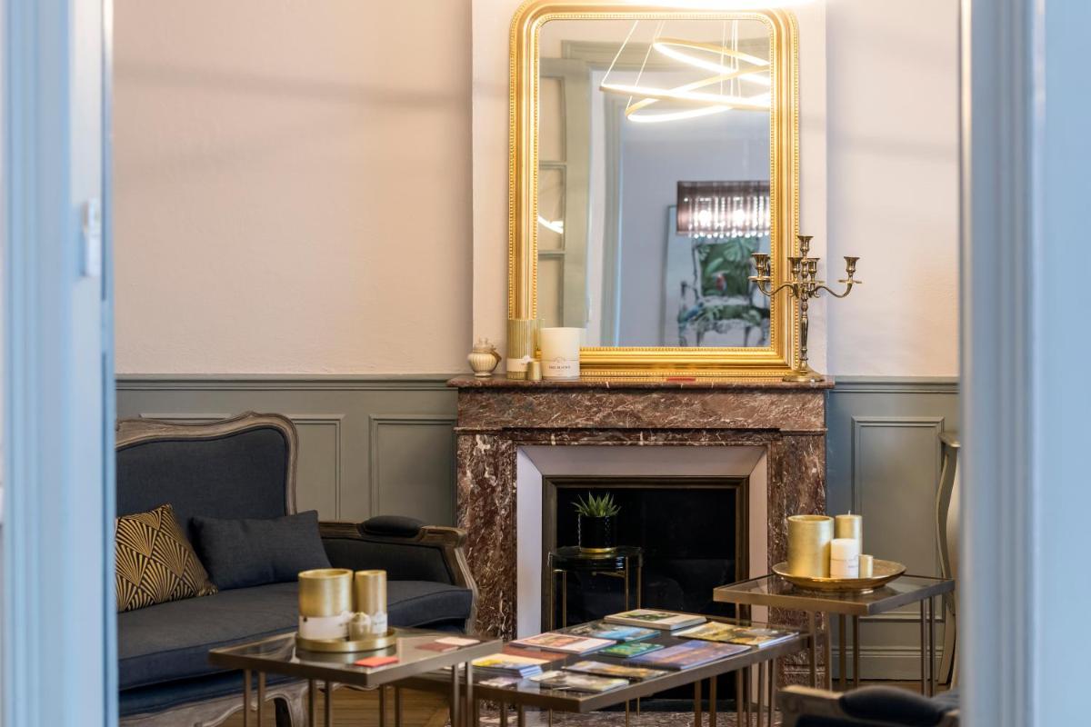 Suites Mana - La Perle des Isles , Superbe maison Art déco avec balnéothérapie - Housity