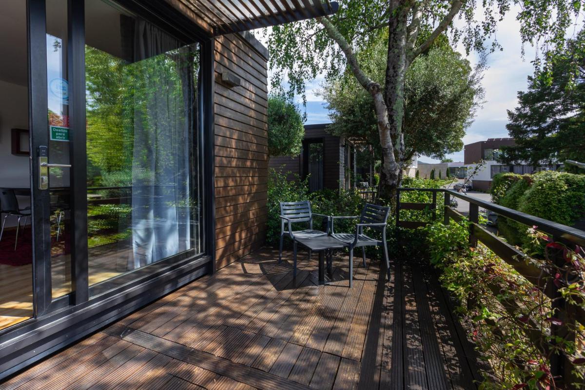 Um jardim no exterior de Prazer da Natureza Resort & Spa