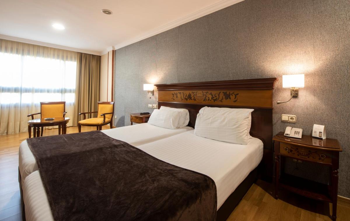 Cama o camas de una habitación en Eurostars Araguaney