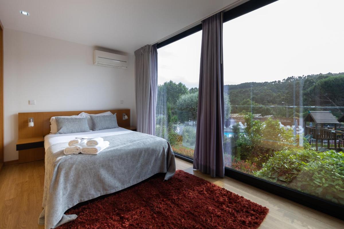 Uma cama ou camas num quarto em Prazer da Natureza Resort & Spa