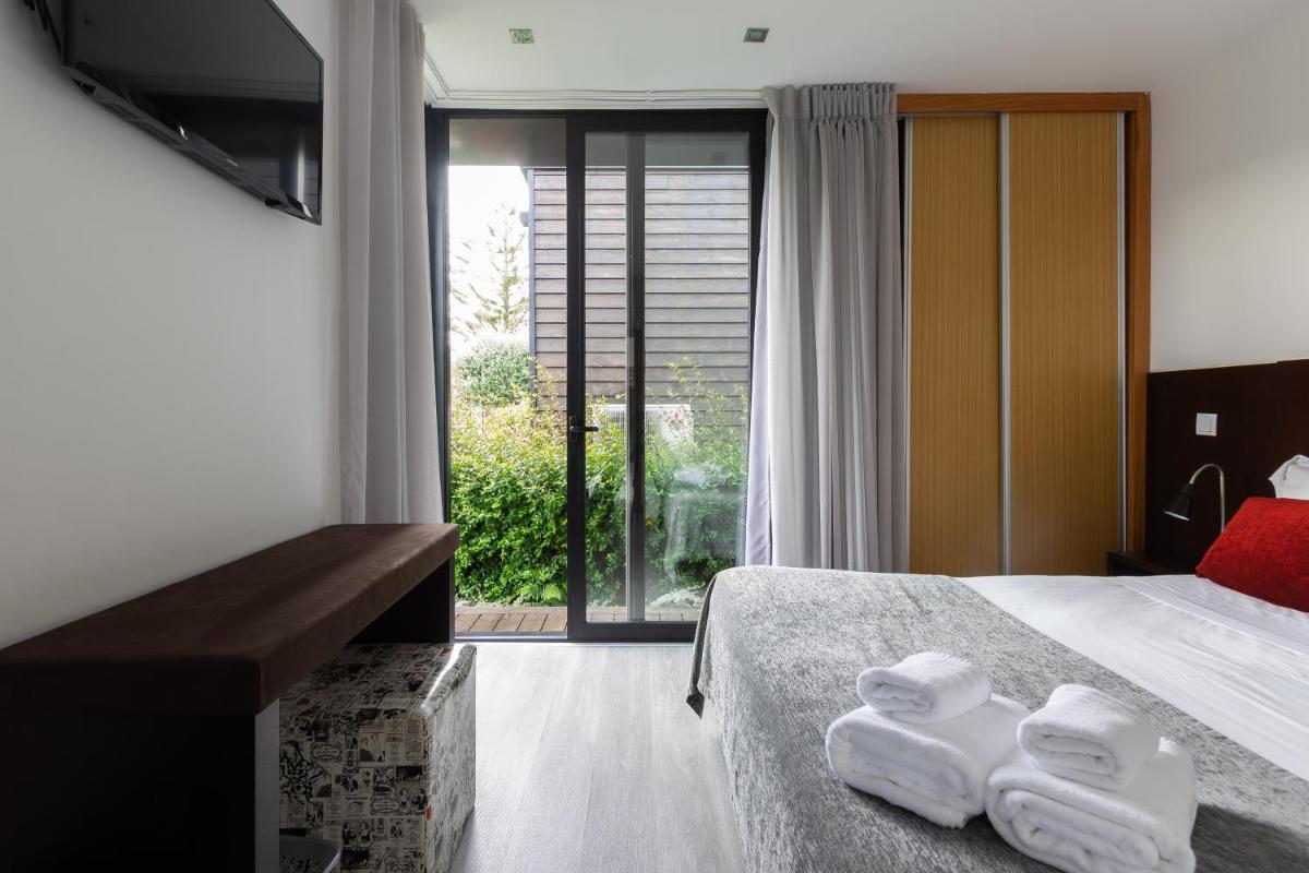 Uma cama ou camas num quarto em Prazer da Natureza Resort & Spa