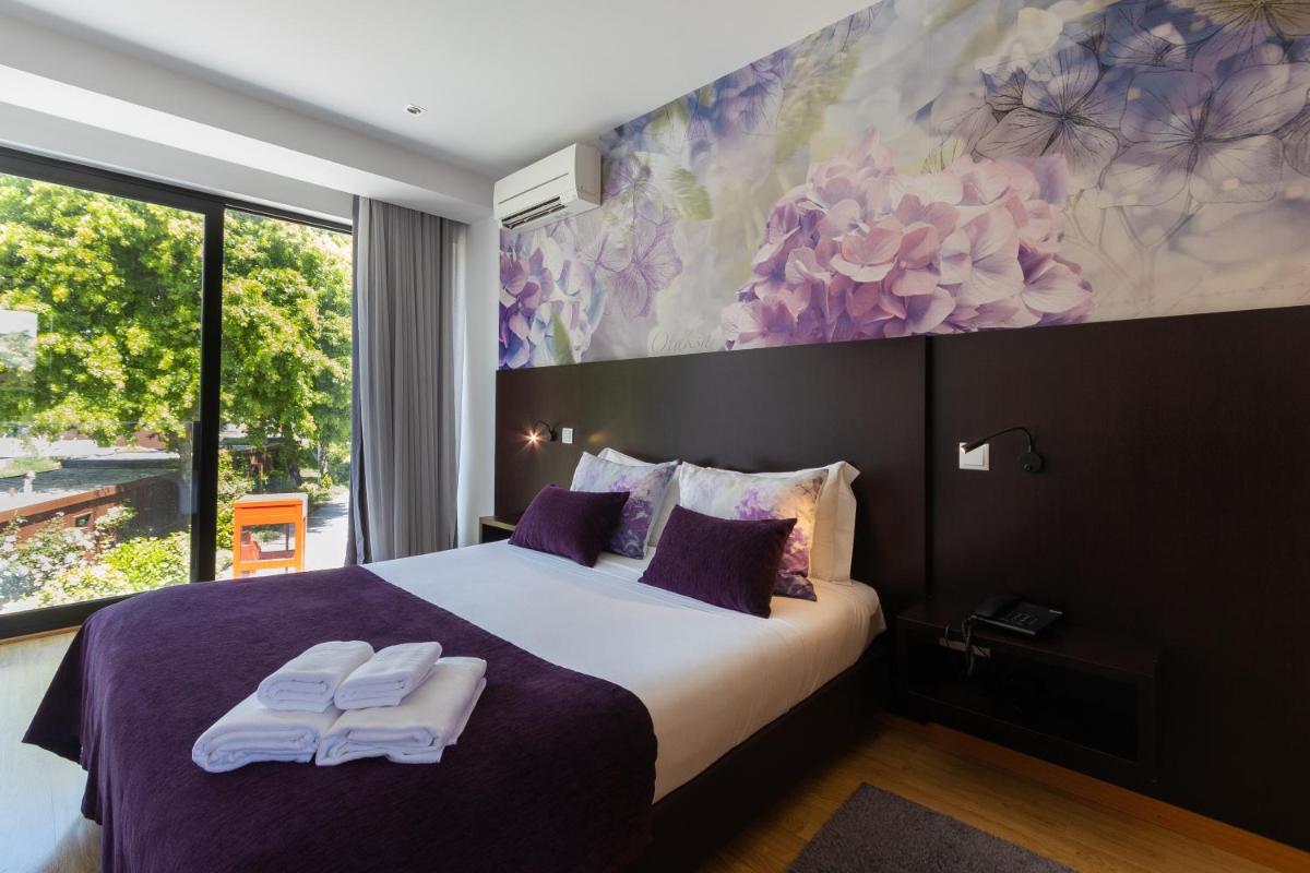 Uma cama ou camas num quarto em Prazer da Natureza Resort & Spa