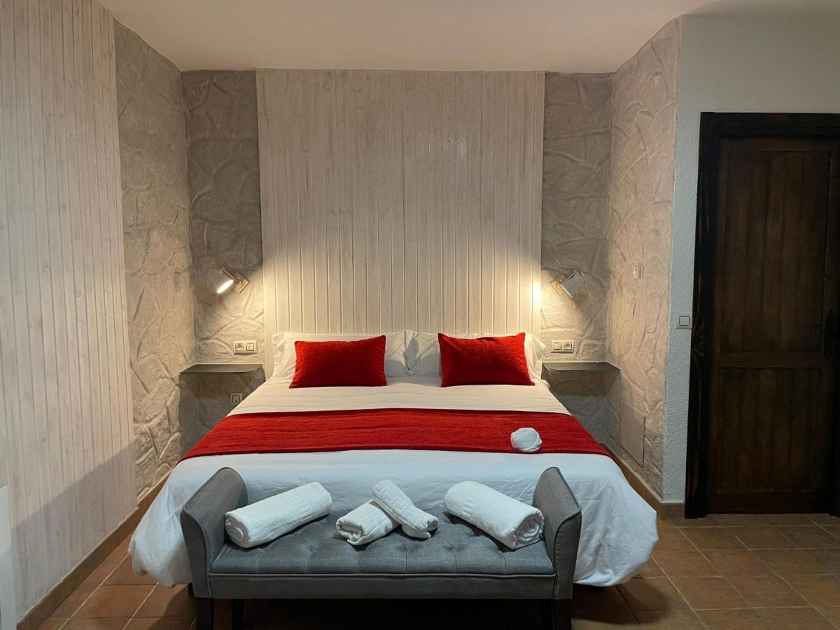 Cama o camas de una habitación en Turismo Rural & SPA El Cercado