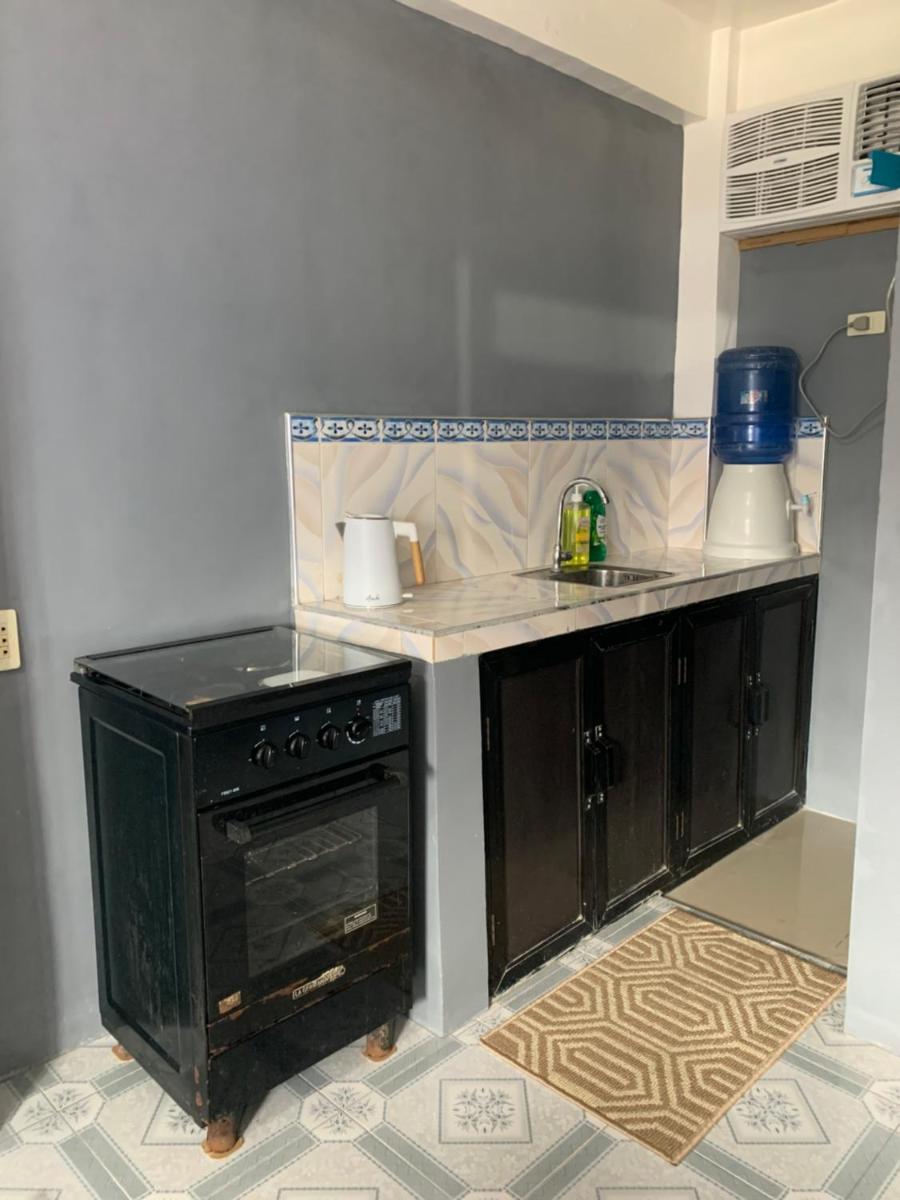Gray Apartment Catangnan Back Road - Housity