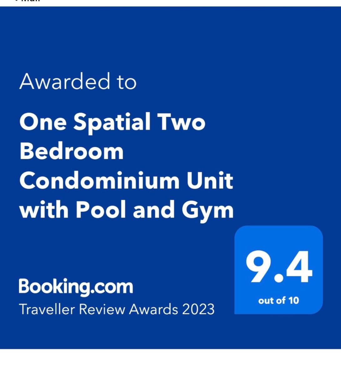One Spatial Two Bedroom Condominium Unit with Pool and Gym free Netflix and wifi - Housity