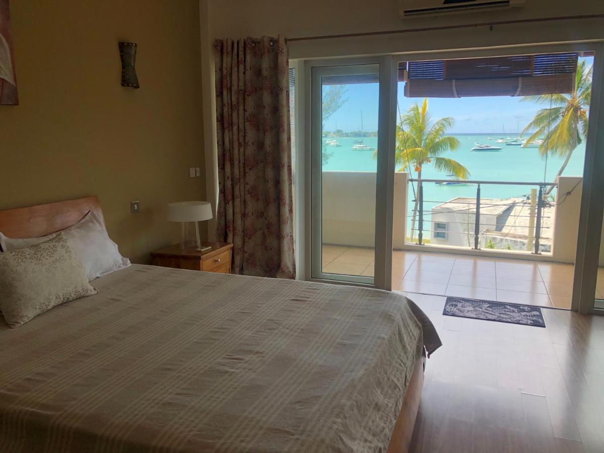 Ocean-view penthouse with roof terrace, Grand Baie, Waterside complex - Housity