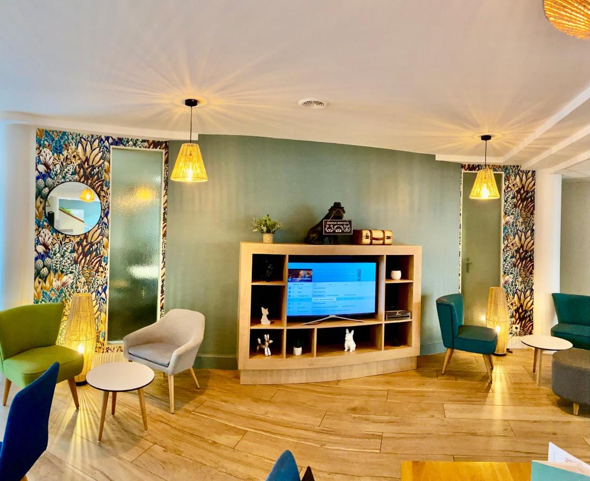 Télévision ou salle de divertissement dans l'établissement Holiday Inn Calais Coquelles by IHG